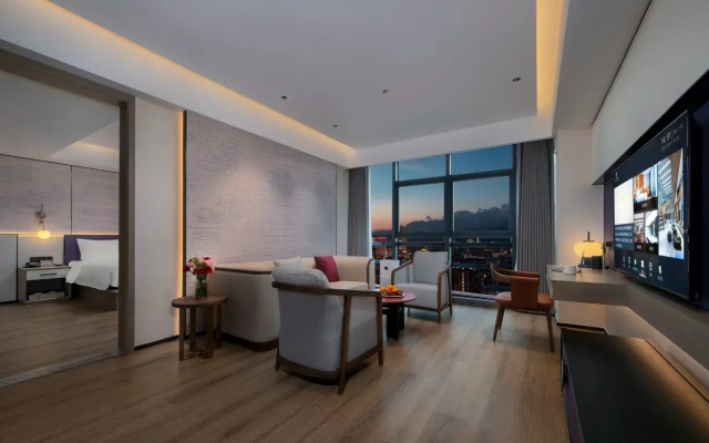 Maison New Century Hotel