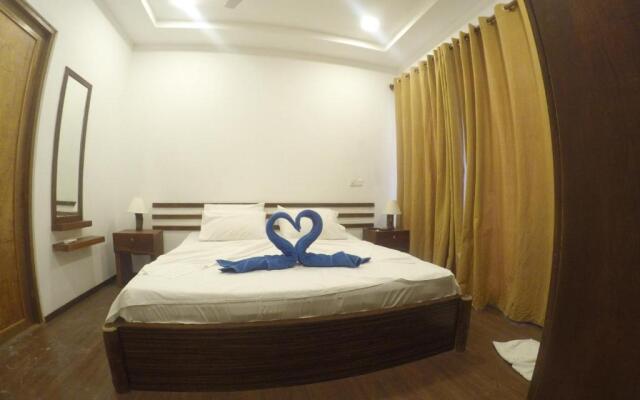 Dhiffushi White Sand Beach Hotel