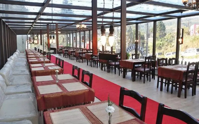 Flagship 75947 Hotel Rainforest Thalayathimund