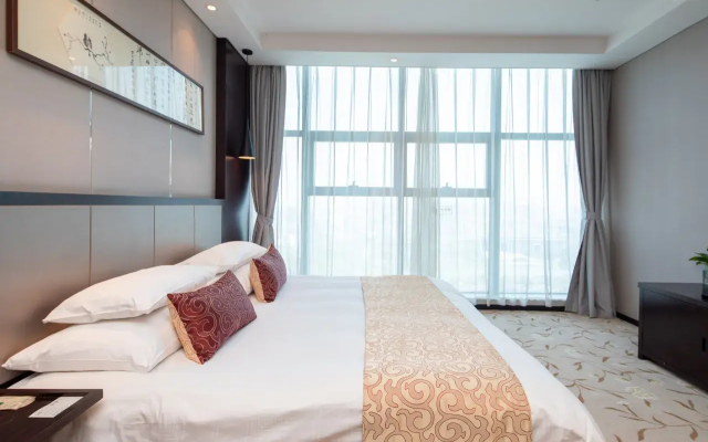 Scholars Hotel (Zhenjiang City Government Sports Exhibition Center)