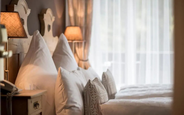 Alpstay — Chalet Hotel Hartmann