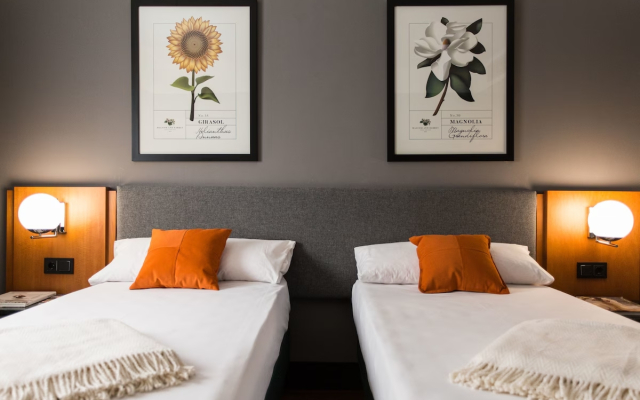 Отель Malcom and Barret