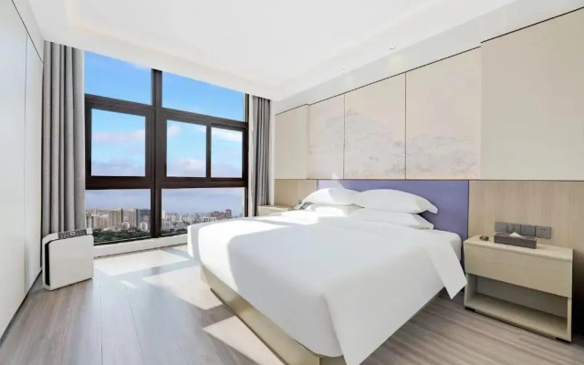 Отель New Century Mansion Cixi Guanhaiwei