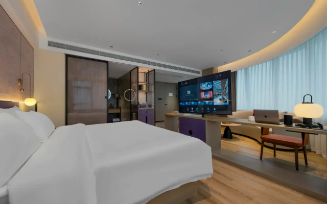 Maison New Century Hotel