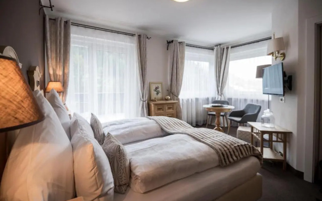 Alpstay — Chalet Hotel Hartmann