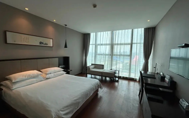 Scholars Hotel (Zhenjiang City Government Sports Exhibition Center)