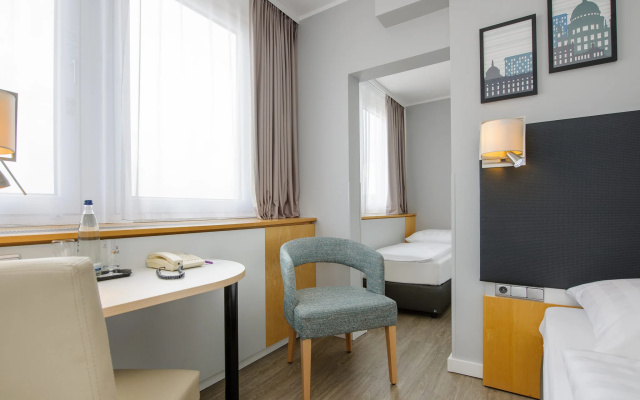 Standard Triple room (full double bed and single bed)