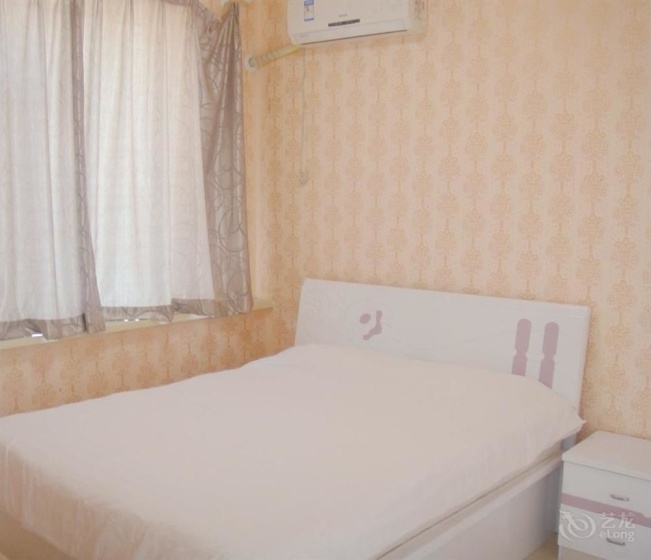 Dalian Xinghaijiaxin Apartment — комфортный отель в Даляне