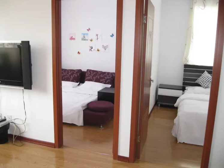 Dalian Yijia Apartment — комфортный отель в Даляне