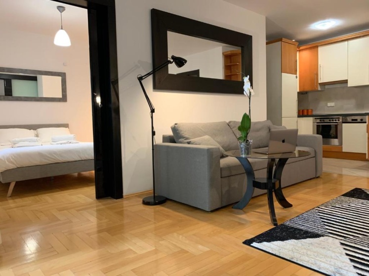 Modern 1BR flat in heart of Warsaw with parking — забронировать отель в Варшаве