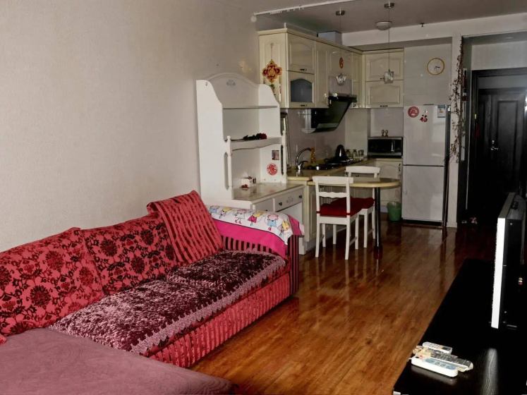 Dalian Xiu Zhu Mansion Apartment — отель в Даляне, Китай