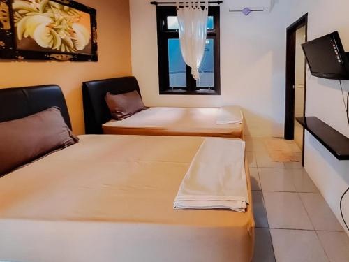 OYO 2702 Arimanu Guest House — забронировать отель в Кута