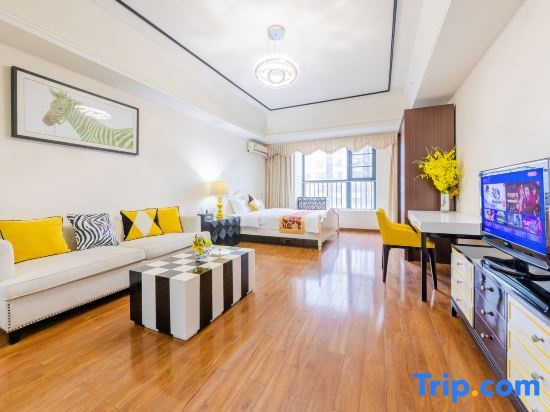 Tuyu Theme Apartment (Guangzhou Luogang Wanda Suyuan Subway Station) — отель с удобствами в Гуанчжоу