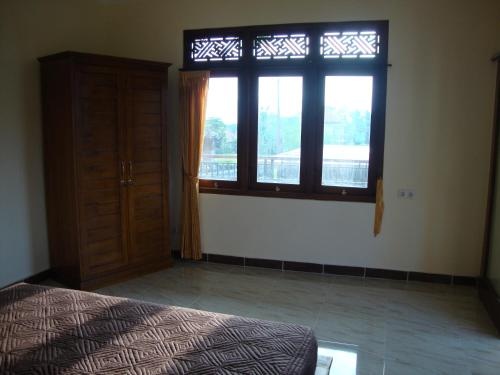 Flamboyan Guest House — отель с удобным расположением в Убуде