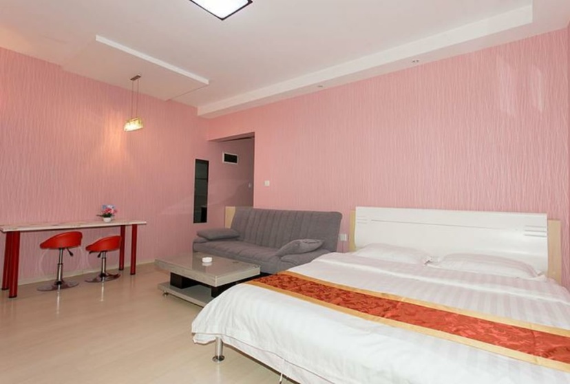 Xinghai Haiyue Bay Suites Apartment — отель с удобствами в Даляне