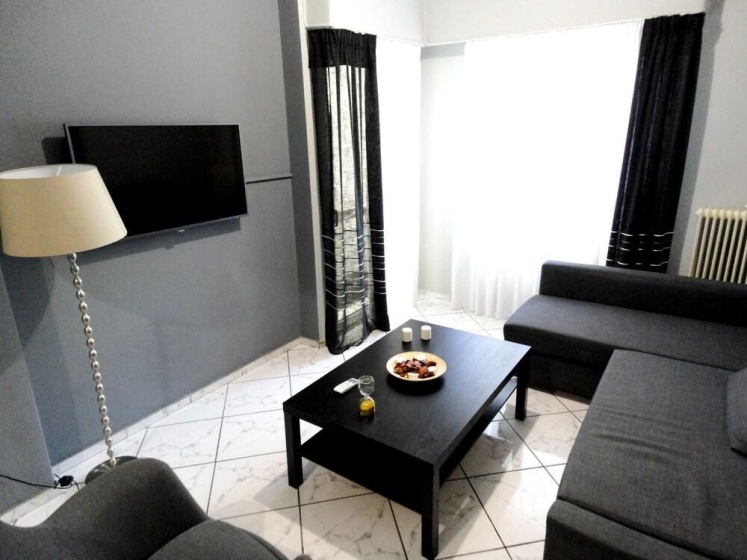 Cozy 2-Bedroom Apartment near Acropolis — забронировать отель в Афины