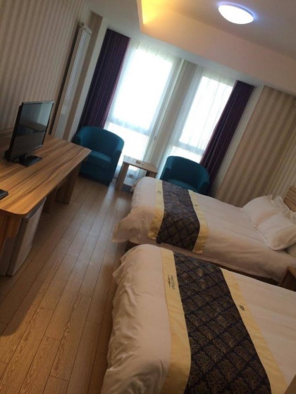 Tujia Sweetome Apartment Qingdao Golden Square — забронировать отель в Циндао