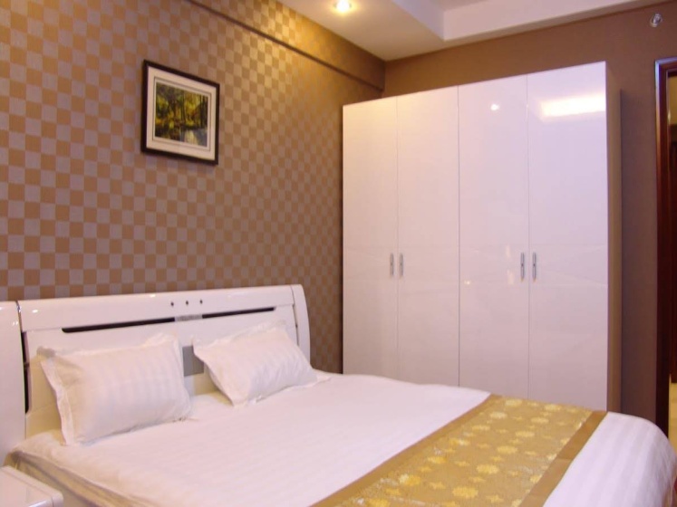 Dalian Jiuxing Apartment — комфортный отель в Даляне