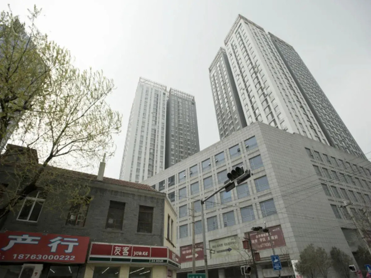 Qingdao May Flower Apartment — забронировать отель в Циндао