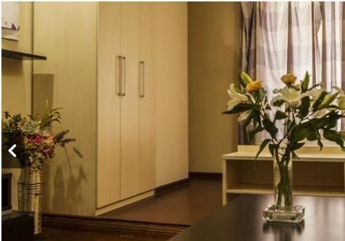Qingdao Aikejia Apartment — забронировать отель в Циндао