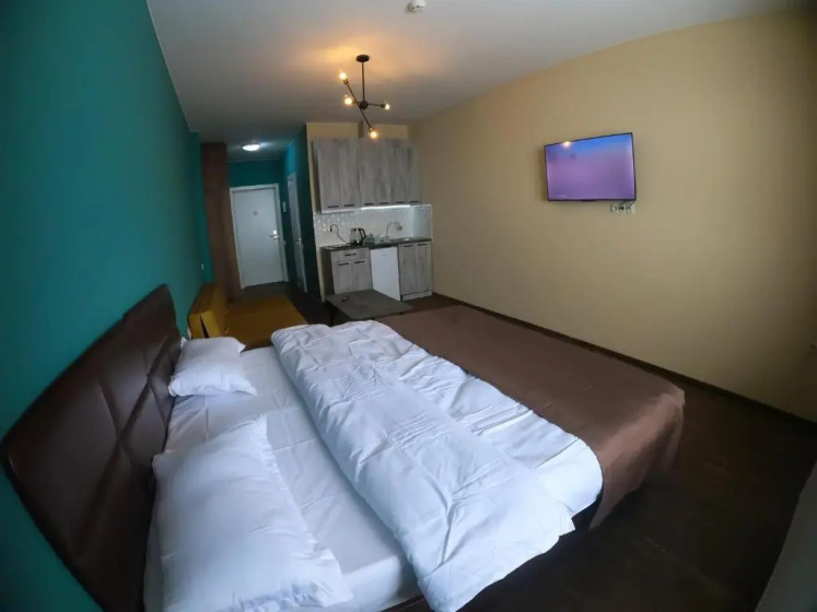 Cozy Apartment near Gondola Lift — отель с удобным расположением в Гудаури