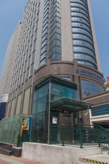 Qingdao Lidu Haiyangfeng Service Apartment — отель в Циндао, Китай