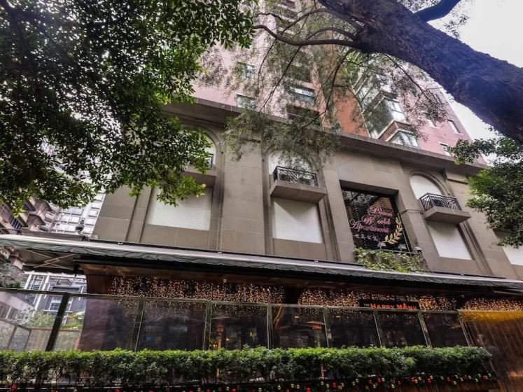 Good World Apartment (Guangzhou Cancer Hospital Taojin Metro Station) — отель с удобным расположением в Гуанчжоу