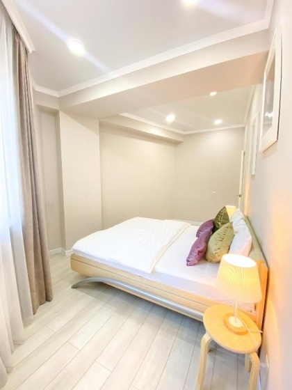 Modern Apartment in 10 min walk from Dostyk street — отель в Алматы, Казахстан