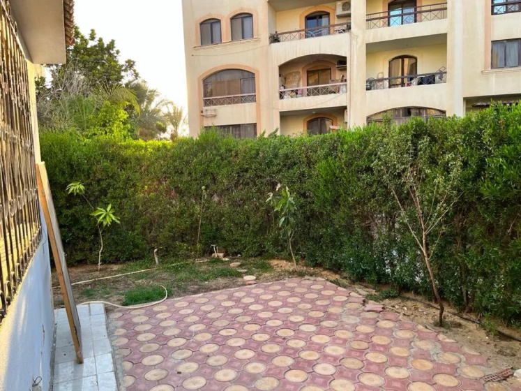 Comfortable apartment with a private garden near AUC شقه فندقيه — отель с удобным расположением в Каире