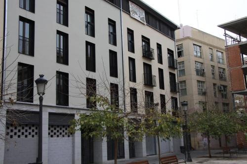 Apartamentos Hiedra y Tapinería Mercado Central — отель с удобствами в Валенсии