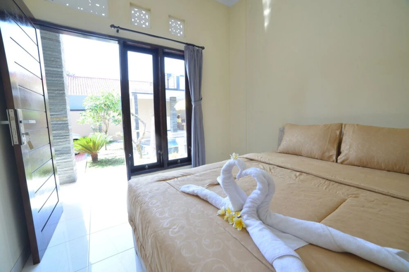Flagship 91237 Ratu Guest House — отель в Кута, Индонезия