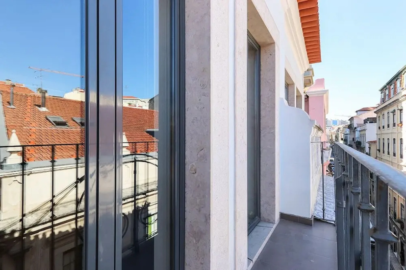 Цены на JOIVY Bold & classy 2BR home w/balcony in Baixa, moments from shopping streets в Лиссабоне