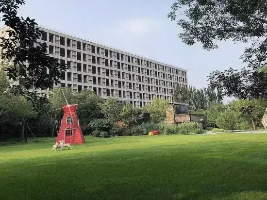 Beijing Xiangtu Apartment — забронировать отель в Пекине