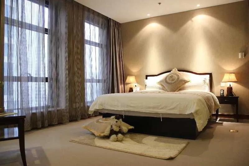 Dalian Asia Pacific Service Apartment — отель с удобствами в Шанхае