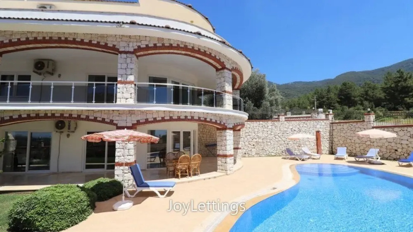 Villa NKL1 by JoyLettings — отель с удобствами в Олюдениз