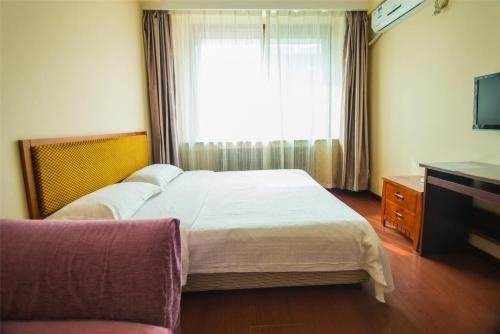 Dalian Guohua Apartment — отель в Даляне, Китай