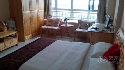 Цены на Yiju Fashion Holiday Apartment в Циндао
