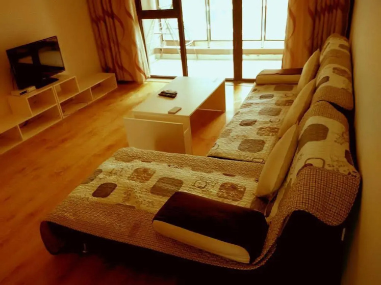 Qingdao Ryan Apartment — отель с удобствами в Циндао