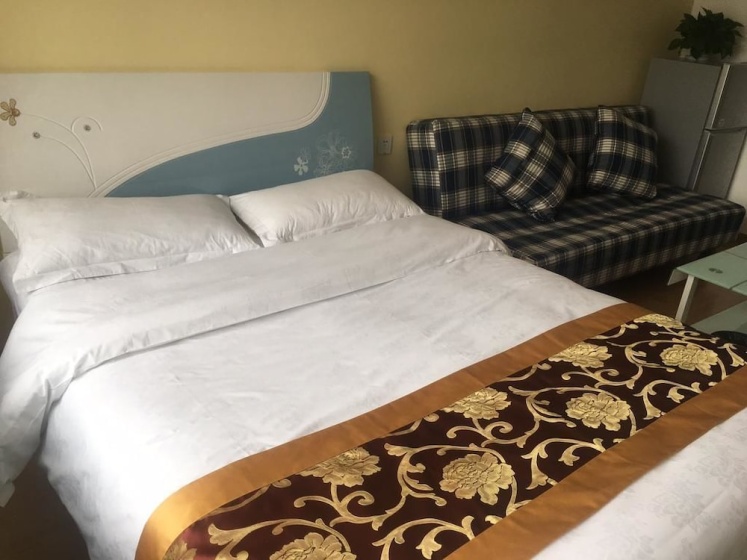 Chengdu Tianfu Holiday Botique Apartment — отель с удобствами в Чэнду