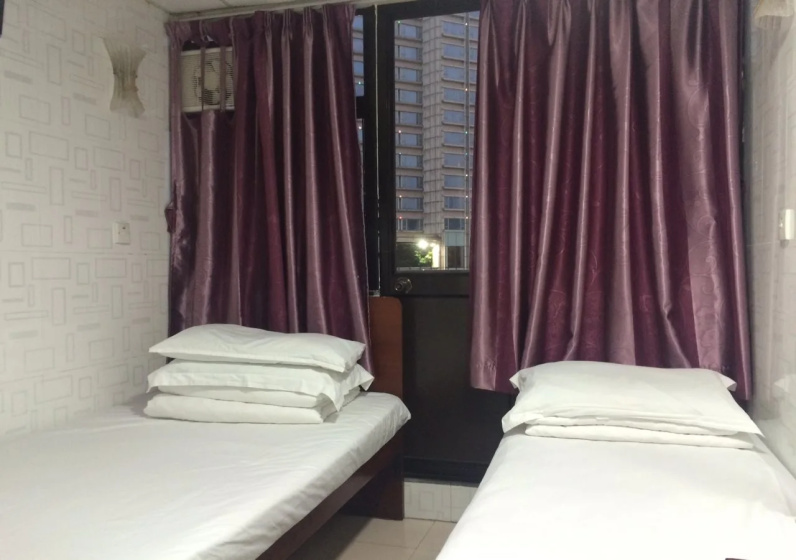 Wing Ming Guest House — отель с удобствами в Гонконг