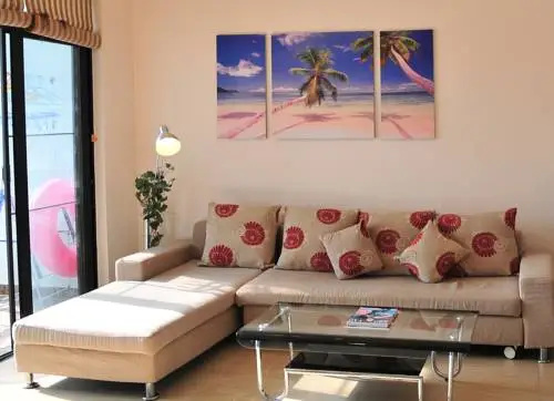 Sanya Le Zai Lv Tu Apartment — отель в Санье, Китай