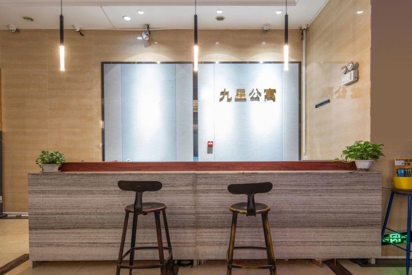 Guangzhou Jiu Xing Service Apartment — отель в Гуанчжоу, Китай