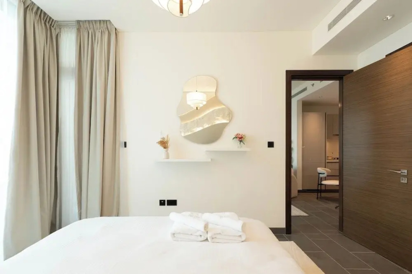 Chic 1BR Apartment - The Crest Dubai — забронировать отель в Дубае