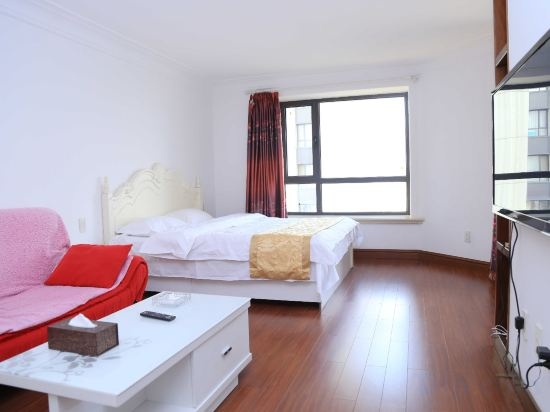 Xiaisi Lexiang Service Apartment (Dalian Xinghai Square) — отель с удобствами в Даляне