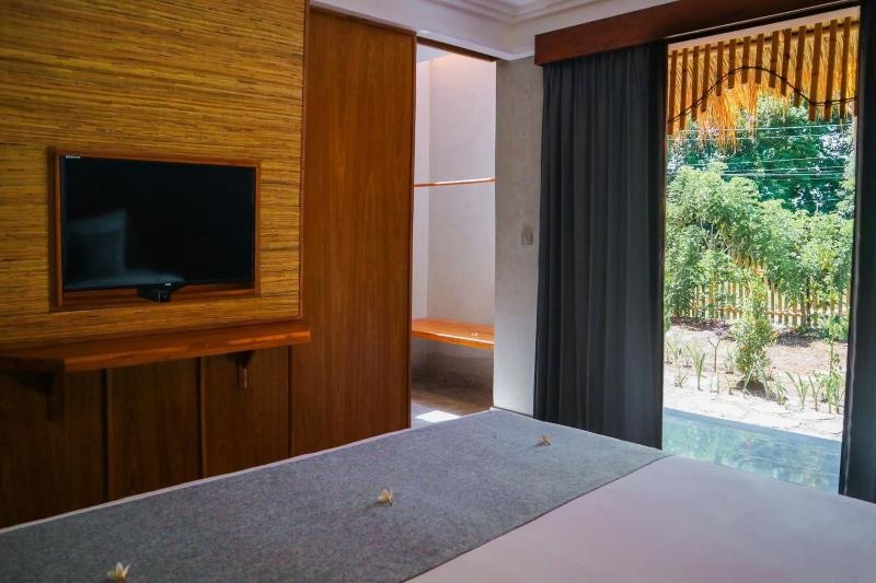 De Rekun Guest House — отель с удобствами в Убуде