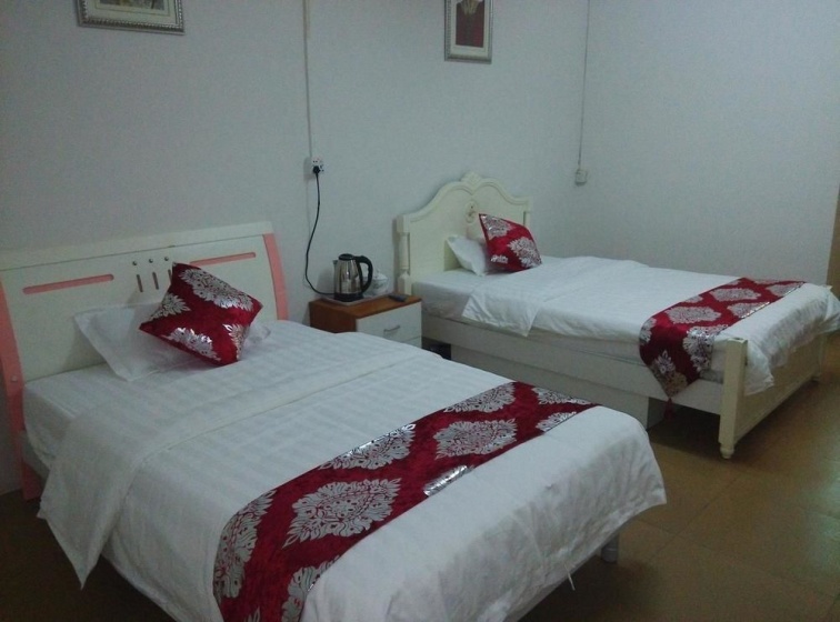 Xinhao Apartment Guangzhou South Railway Station — забронировать отель в Гуанчжоу