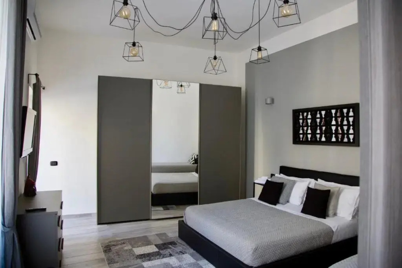 Palazzo Mormando - Modern Apartment — забронировать отель в Неаполе