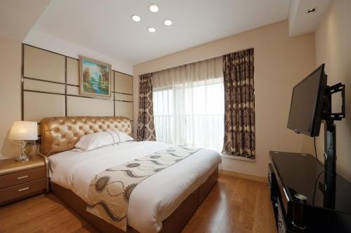 Yishang Apartment Baoli Zhonghui — отель с удобным расположением в Гуанчжоу