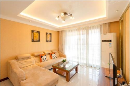 Qingdao Getoom Golden Beach Apartment — забронировать отель в Циндао