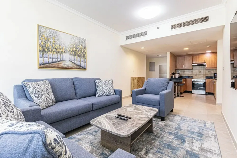 Prime 1BR Global Lake View Mins Metro — отель с удобствами в Дубае